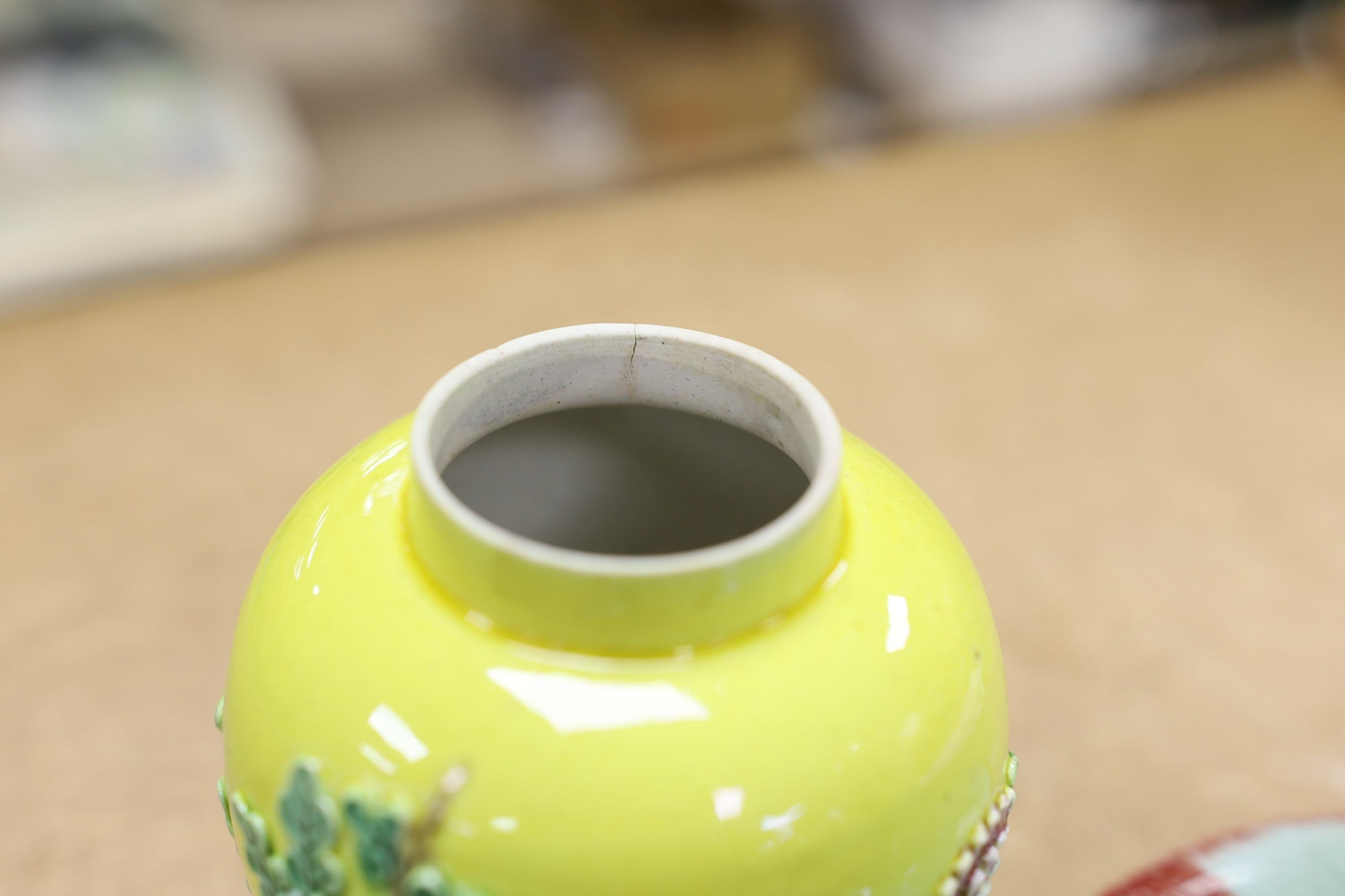 A Chinese enamelled yellow-ground jar and cover, a pottery teapot and cover and a flambe vase, latter 13cm